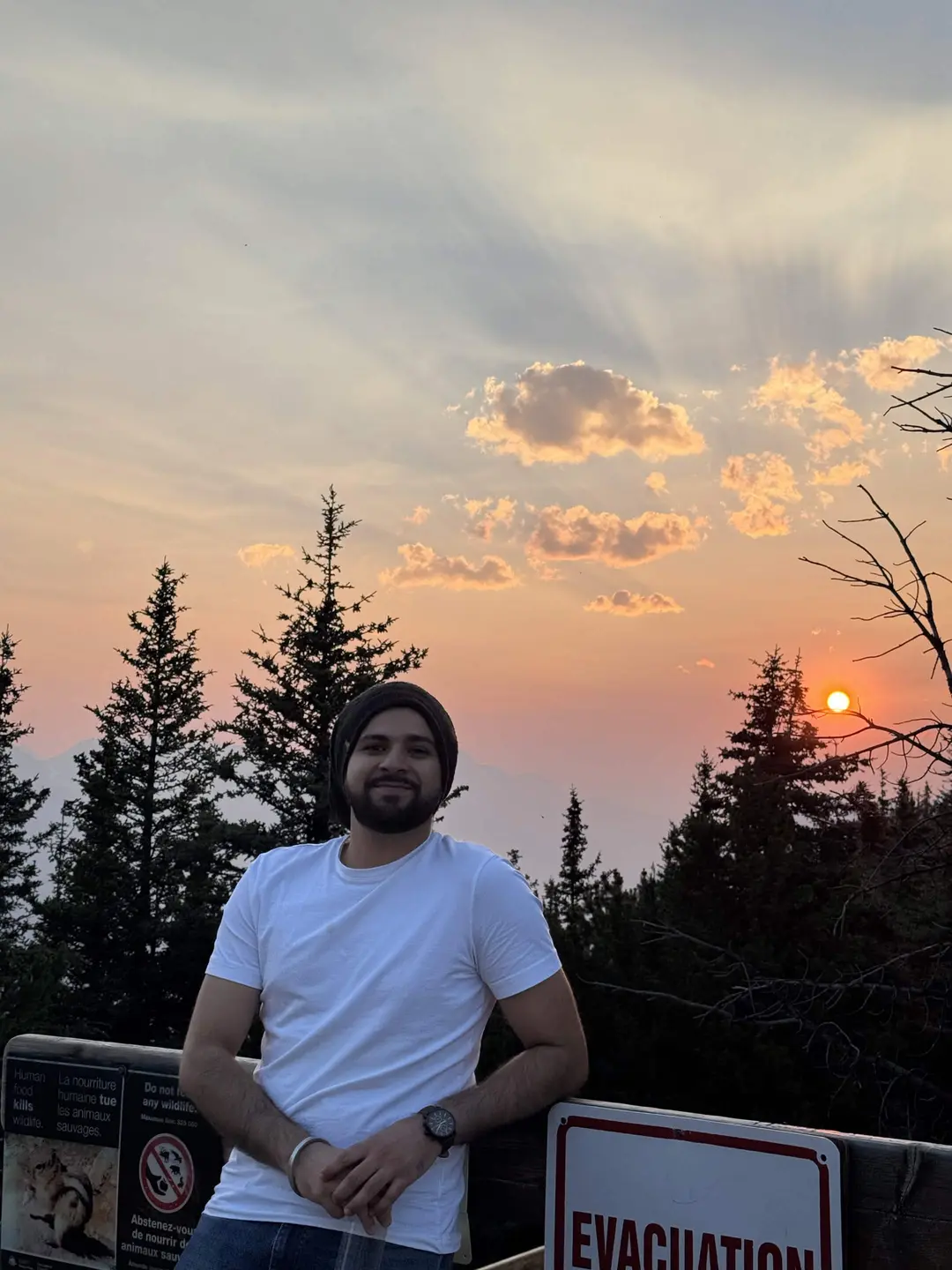 Simranjit Singh Pabla at a mountain overlook at sunset